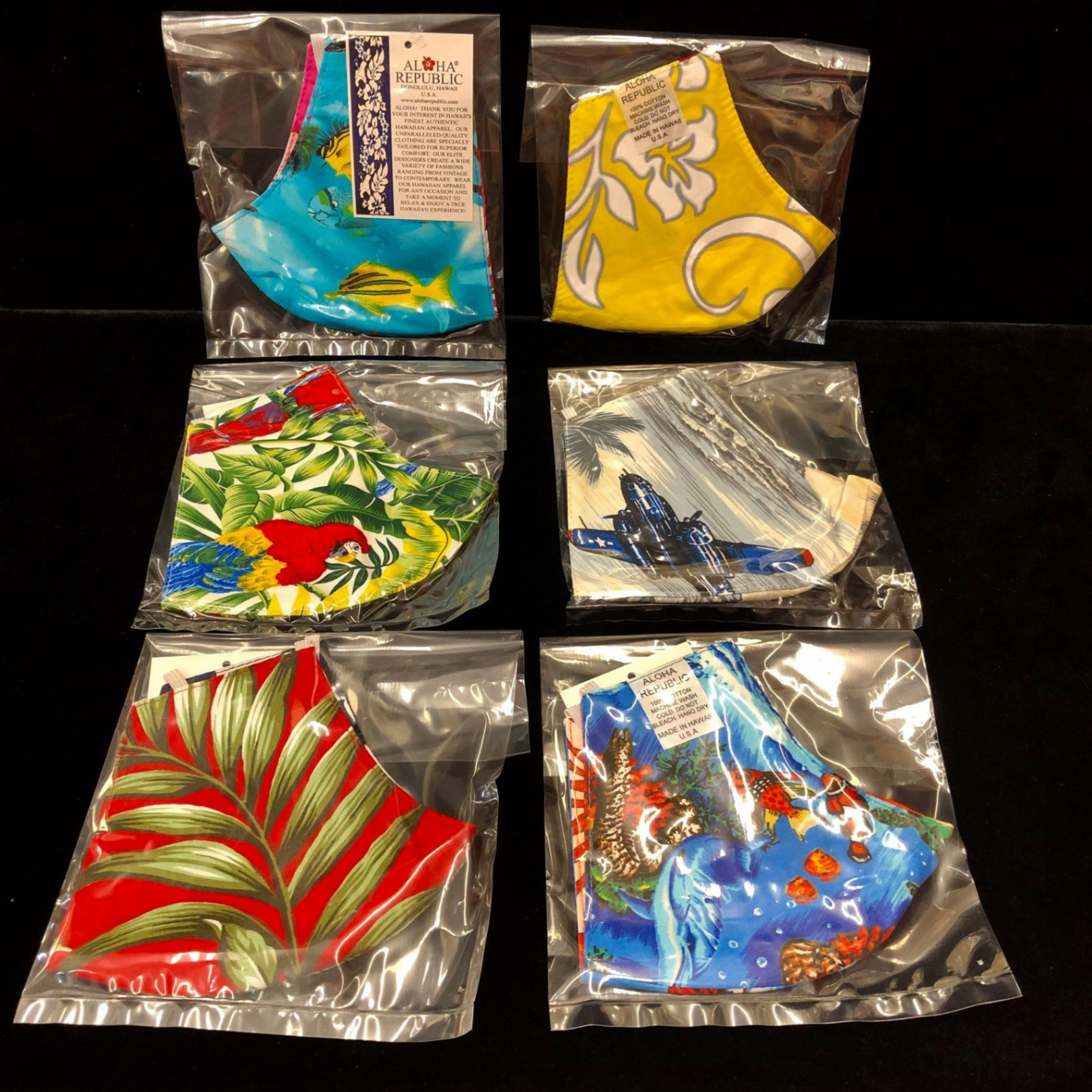Aloha Republic tropical cotton masks featuring parrots, palms, marlin, reef fish and Hawaiian florals
