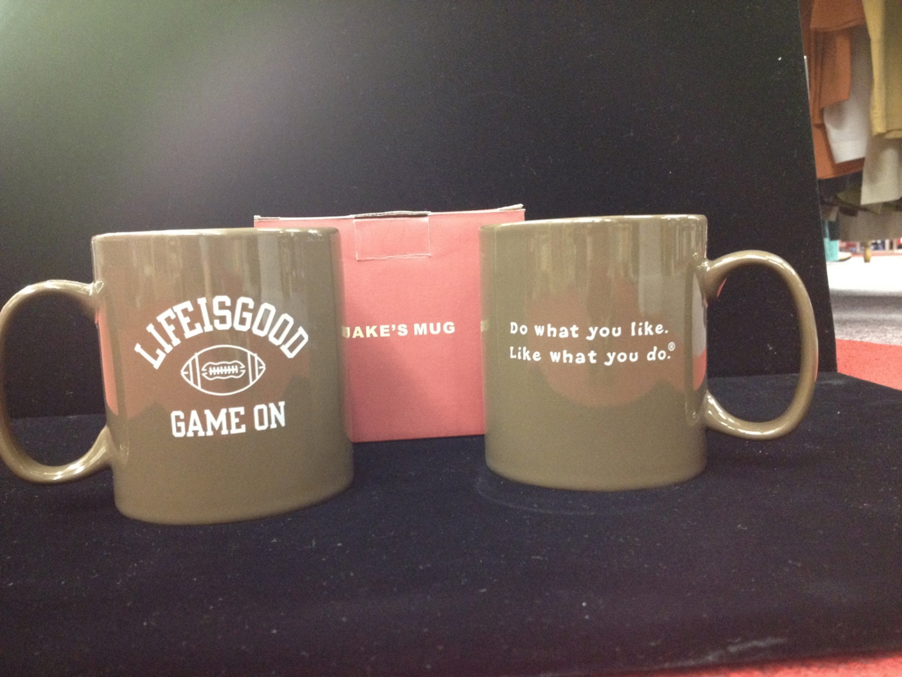 Life is Good olive green football mug showing 'Game On' on one side and 'Do what you like. Like what you do.' on the other